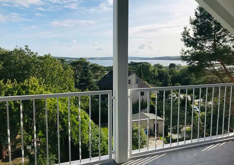 Ferienimmobilie Rügen, Balkon mit Boddenblick
